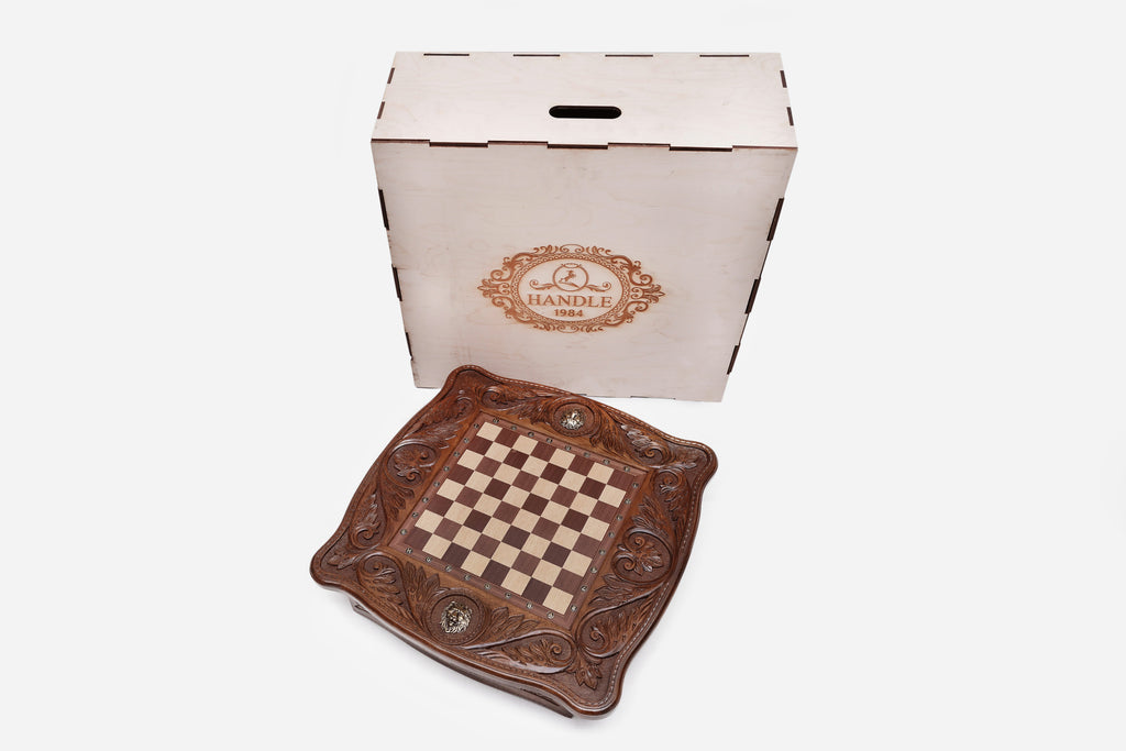 Hand-carved lion chess table from above