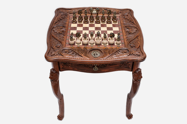 Lion chess table with figural bronze pieces