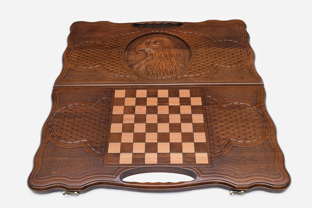 Angled view of the eagle head carved backgammon board