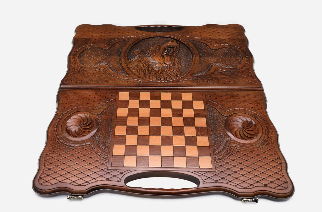 Angled view of the bear carved backgammon board