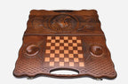 Angled view of the bear carved backgammon board