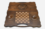 Angled view of the flying eagle carved backgammon board