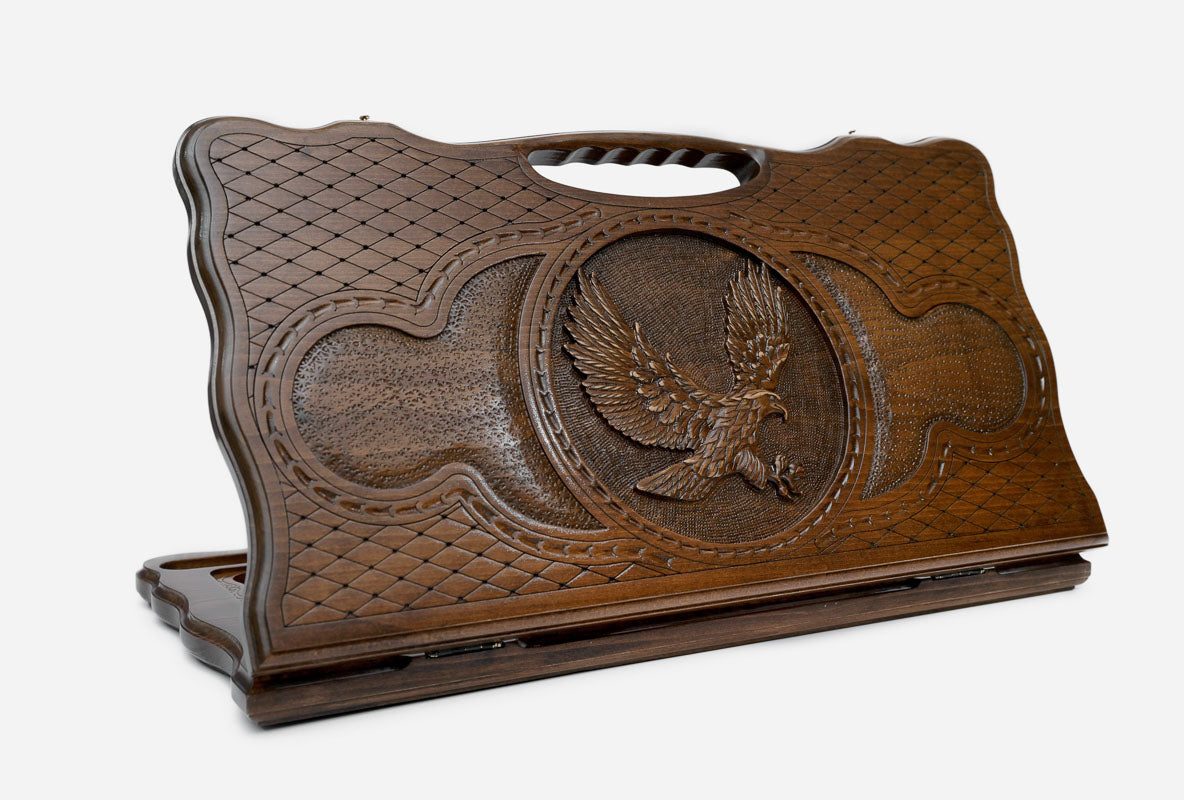 Carved beechwood backgammon board with an eagle in flight and a carry handle, propped open