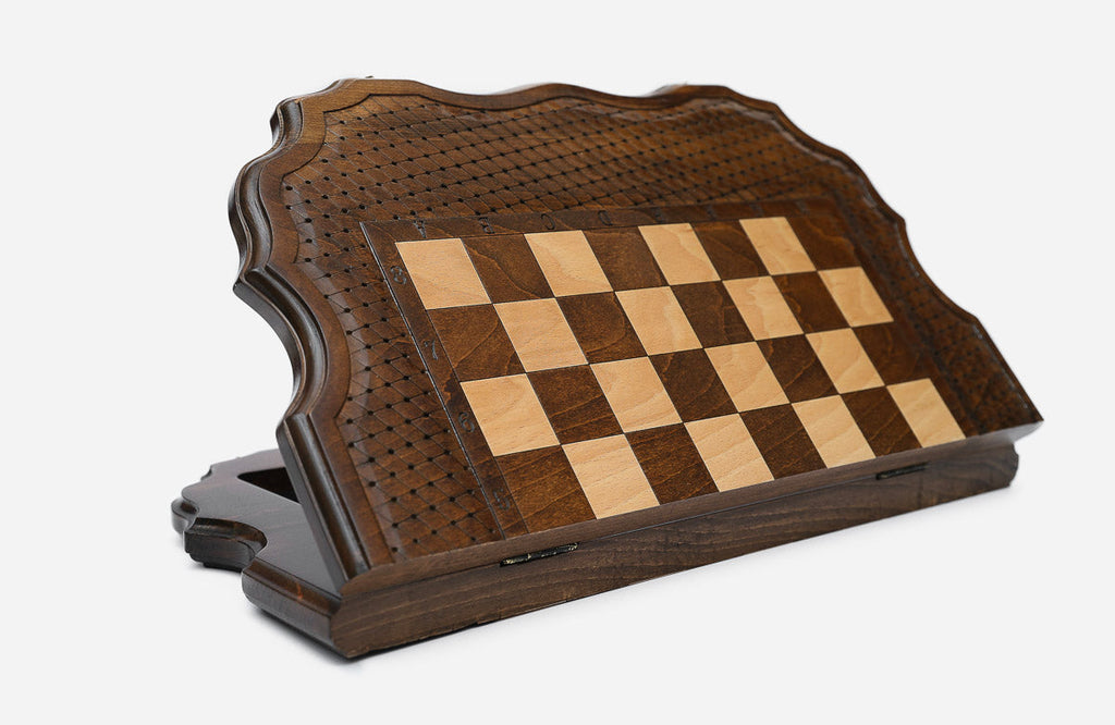 Sculpted-edge chess set shown folded