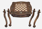 Eagle chess table, bronze pieces close-up