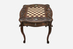 Hand-carved eagle chess table with bronze army, angled view