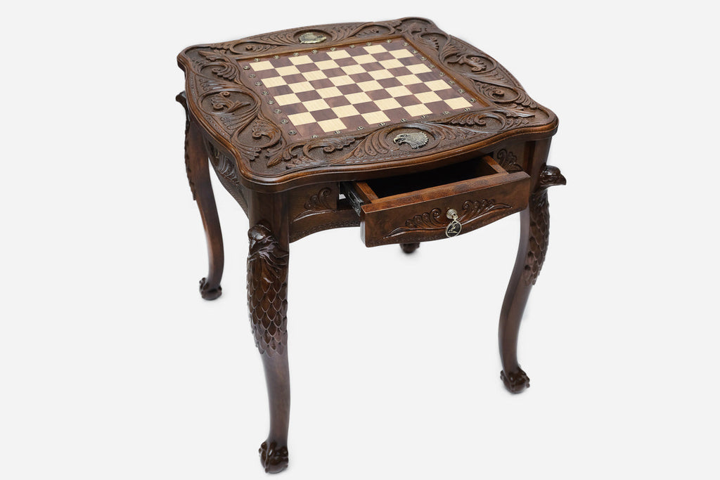 Eagle chess table, carving detail