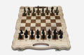 Luxury classic walnut chess set with ornate bronze pieces, the gold army facing the black army in starting position