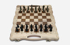 Luxury classic walnut chess set with ornate bronze pieces, the gold army facing the black army in starting position