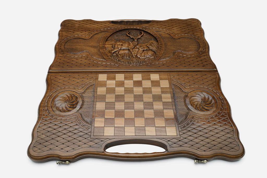 Angled view of the deer carved backgammon board