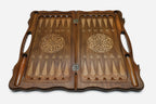 Angled view of the crowned lion carved backgammon board