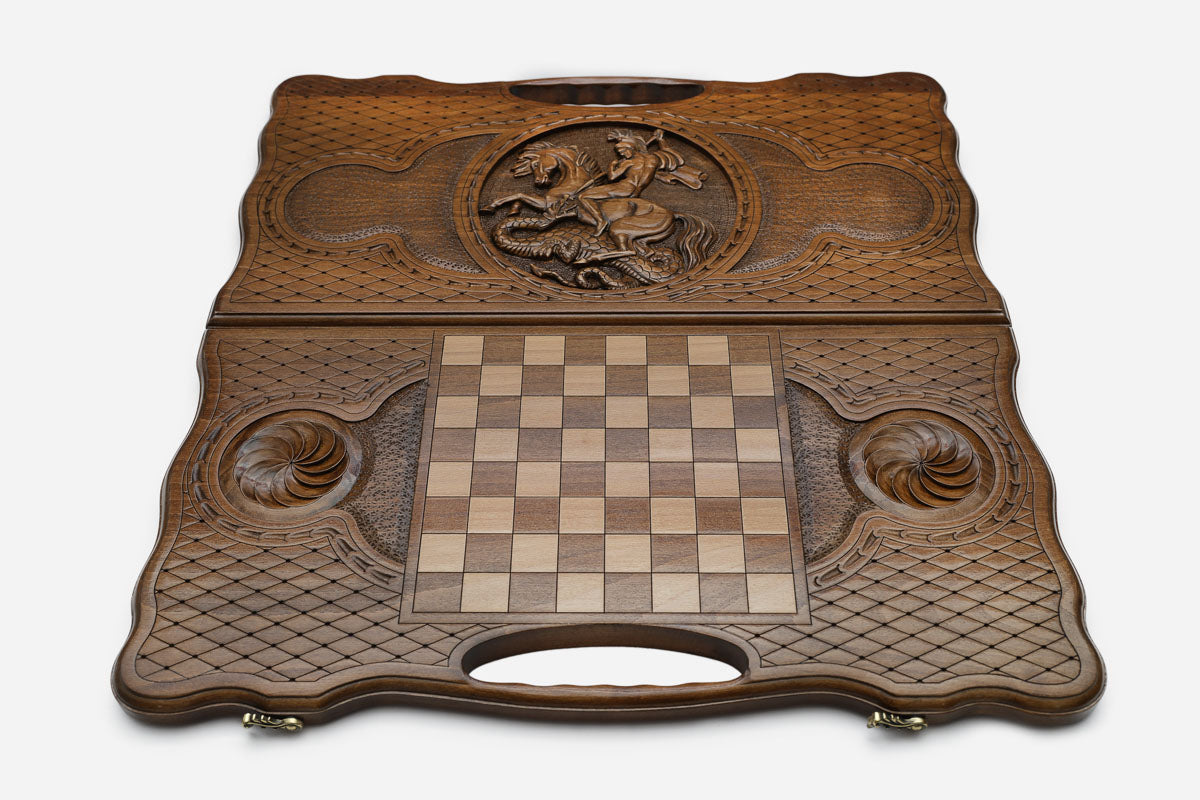 Angled view of the Saint George carved backgammon board