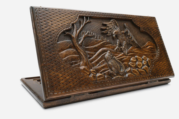 Wooden backgammon set hand carved with a hunting eagle in its stoop
