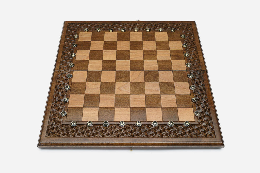 Hand-carved lattice over deep walnut grain
