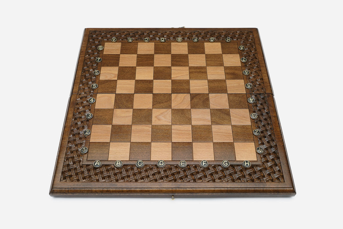 Hand-carved lattice over deep walnut grain