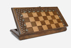 Close-up of the lattice carving on the walnut board