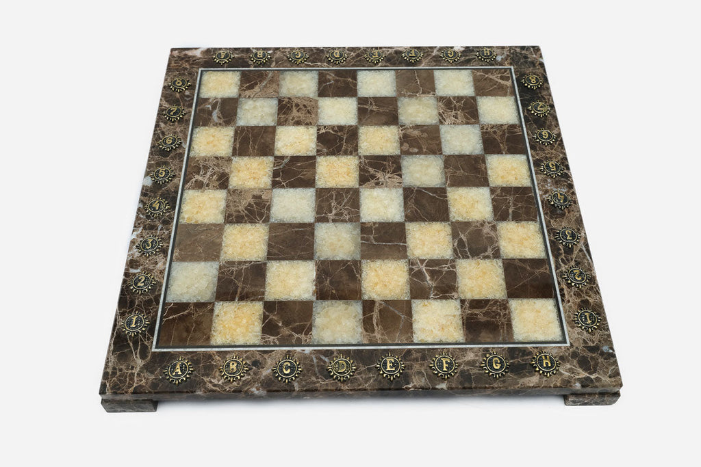 Overhead view of the brown Emperador marble chessboard with cream and brown squares