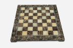 Overhead view of the brown Emperador marble chessboard with cream and brown squares