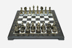 Black marble chess set with hand-cast bronze pieces arranged for play and brass coordinate markers