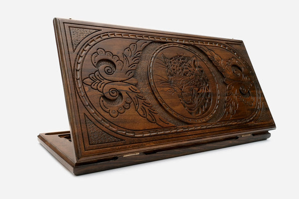 Wooden backgammon set hand carved with a watchful lynx