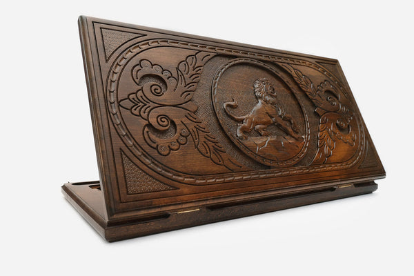 Wooden backgammon set hand carved with a prowling lion