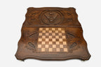 Carved eagle inside a bold octagon frame - wooden backgammon board detail