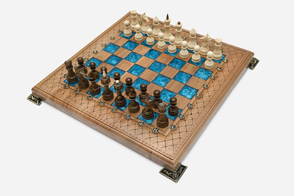 Overhead view of the blue epoxy board and full set of pieces