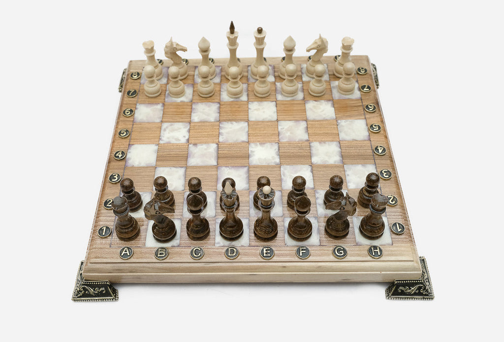 The white epoxy chess set shown from an angle