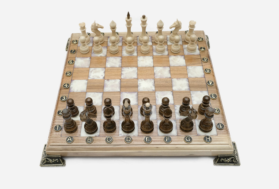 The white epoxy chess set shown from an angle