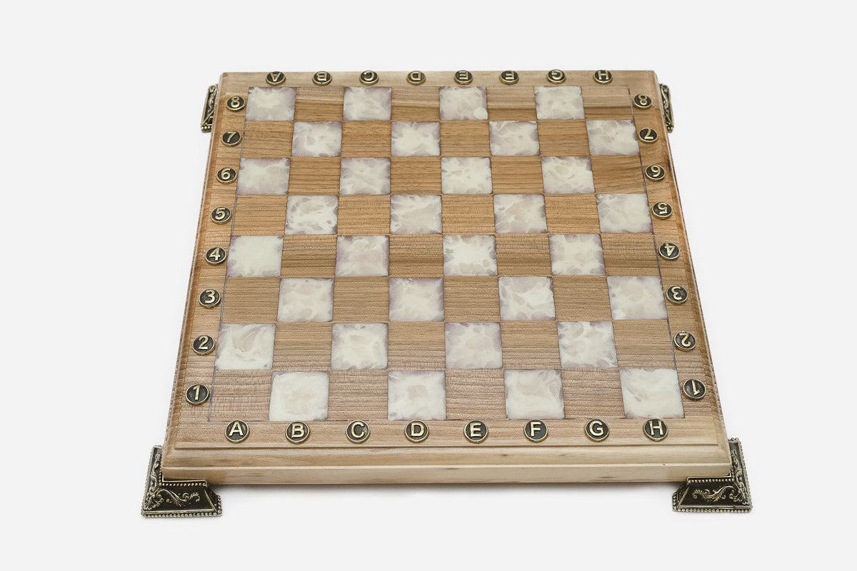 Overhead view of the white epoxy board and full set of pieces