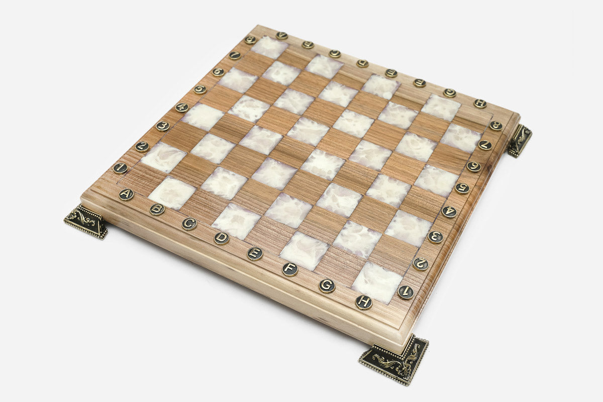Detail of the white marbled epoxy squares and brass markers
