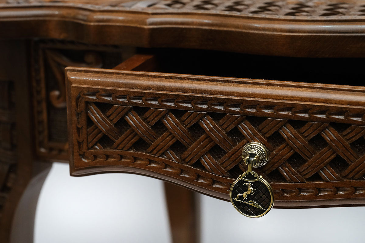 Carved chess table, pedestal detail