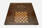 Perched eagle with folded wings hand-carved in wood - backgammon board detail