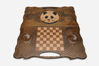 Angled view of the panda carved backgammon board