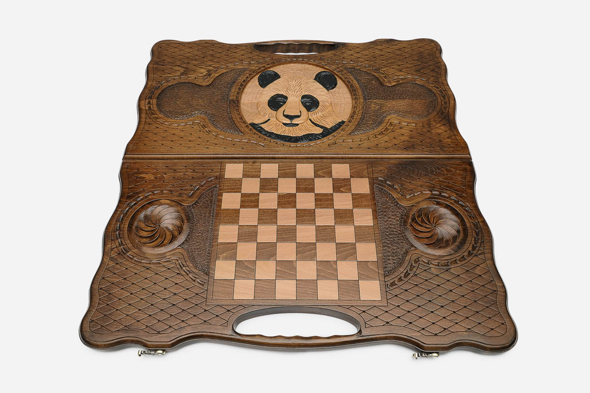 Angled view of the panda carved backgammon board