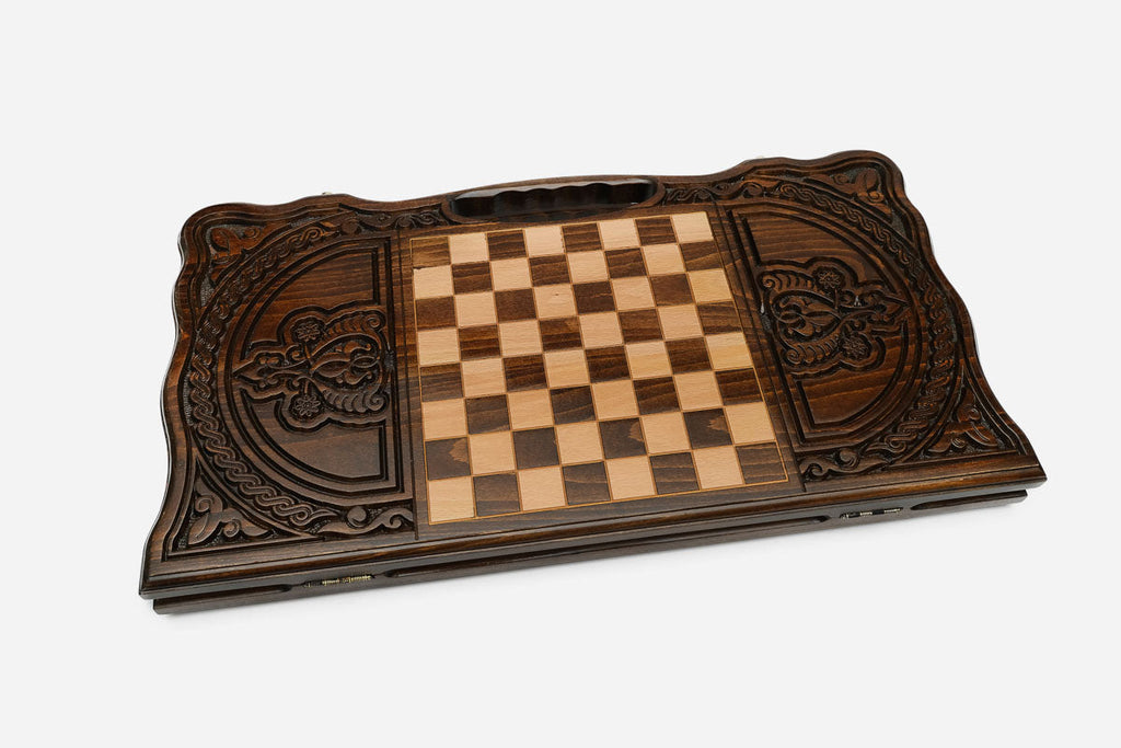 Detail of the scrollwork and border carving