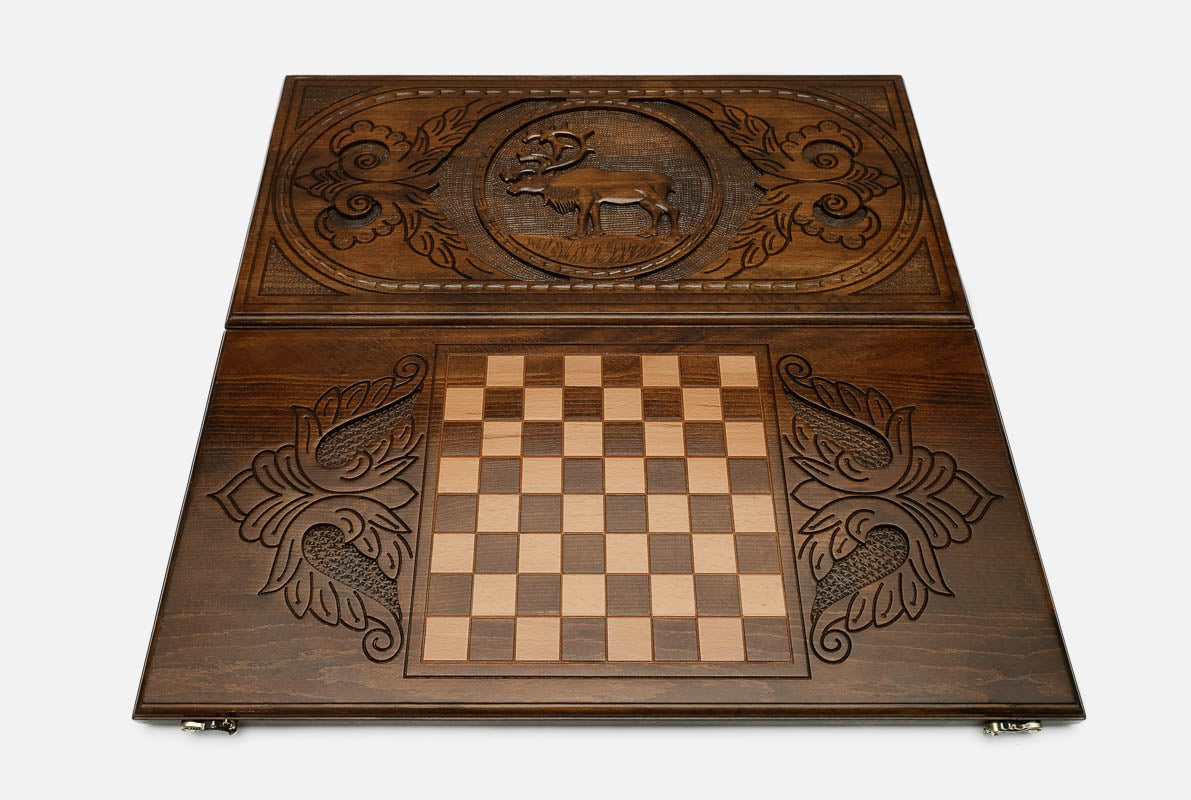 Leaping deer with antlers laid back hand-carved in wood - backgammon board detail