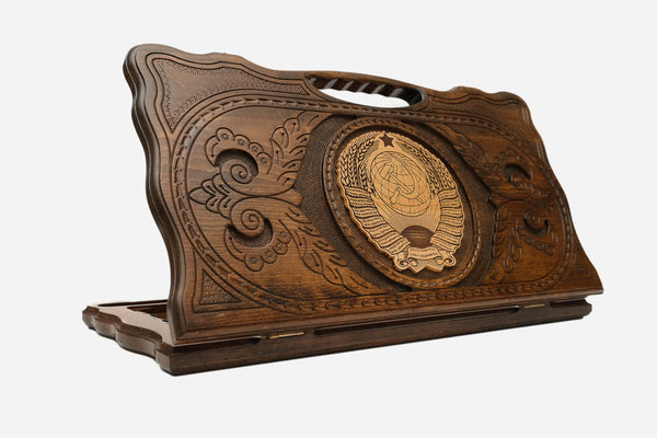 Carved beechwood backgammon board with the USSR coat of arms and a carry handle, propped open