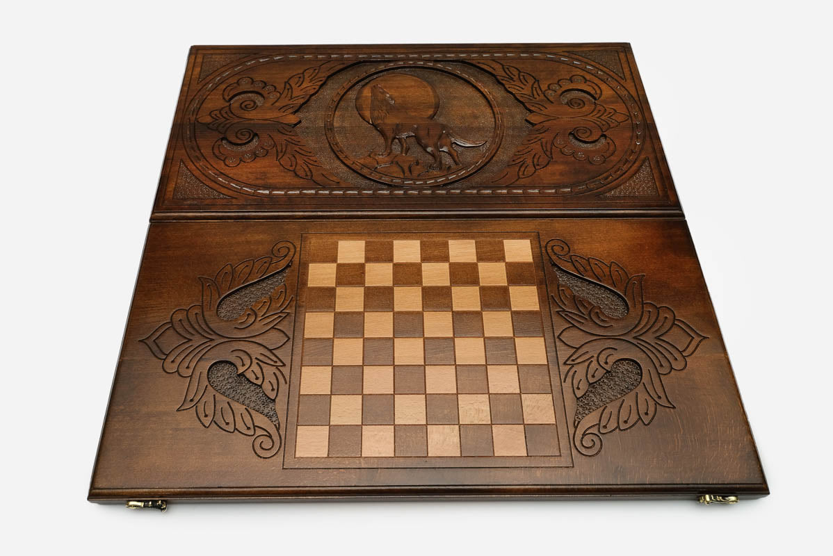 Wolf and moon night scene hand-carved in wood - backgammon board detail