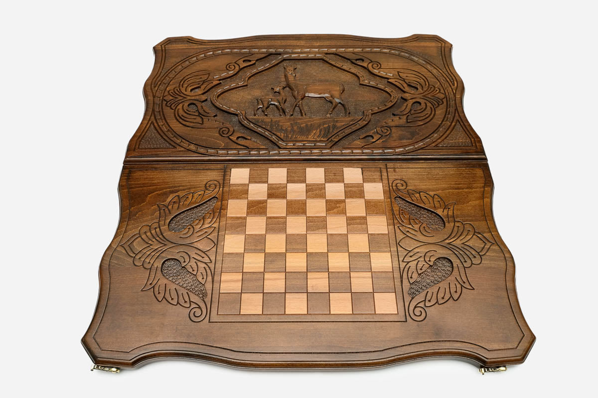 Deer with branching antlers hand-carved in wood - backgammon board detail