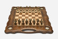 Luxury carved chess set with four inlaid brass stars, lattice borders and ornate bronze pieces set up for play