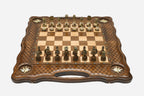 Luxury carved chess set with four inlaid brass stars, lattice borders and ornate bronze pieces set up for play