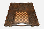 Angled view of the handmade Georgian backgammon set showing the carved lid
