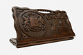 Carved Georgian backgammon board with the emblem of Georgia and a cut-out carry handle, propped open