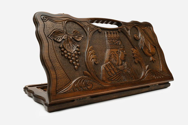 Carved beechwood backgammon board with the enthroned King Tigran the Great and a carry handle, propped open