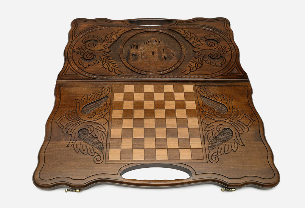Angled view of the handmade St. Hripsime backgammon set showing the carved lid