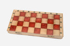 The red epoxy chess set shown from an angle