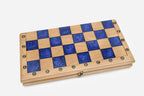 Detail of the royal-blue epoxy squares and brass coordinate markers