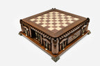 Castle chess set empty board, three-quarter angled view showing the castellated turrets