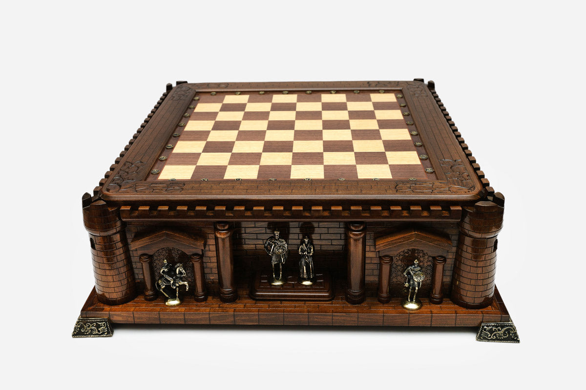 Castle chess set front view showing bronze knight and royal figures in the archways